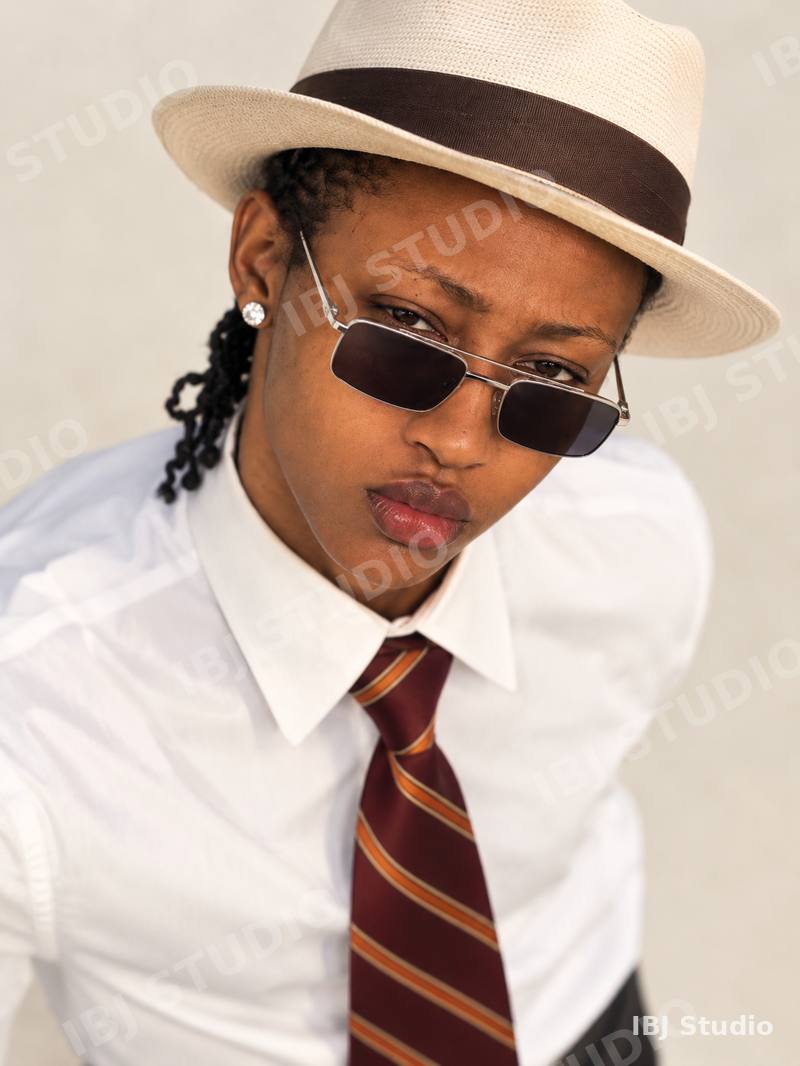 Fedora and sunglasses portrait